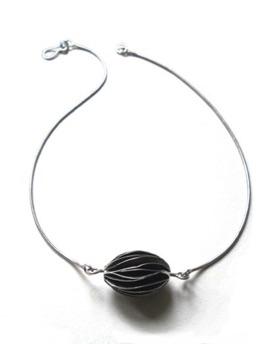 SEED $190-sterling silver necklace with bead of wavy silver pages
(16 1/2" snake chain) SEED $190-sterling silver necklace with bead of wavy silver pages
(16 1/2" snake chain)
